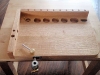 Extension arm attached to front of base       
